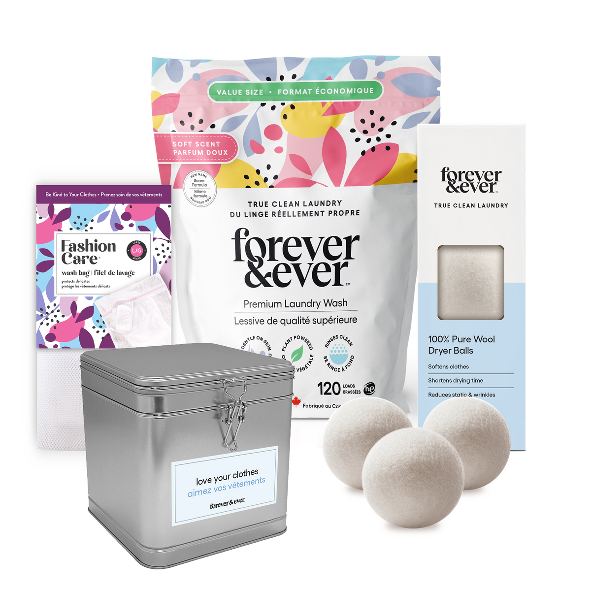 Forever & Ever laundry care products including a tin, dryer balls, and packaging on a white background